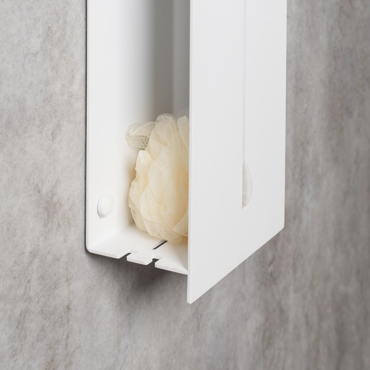 Close-up of the lower part of a vertical organizer, with a detailed view of the fixings