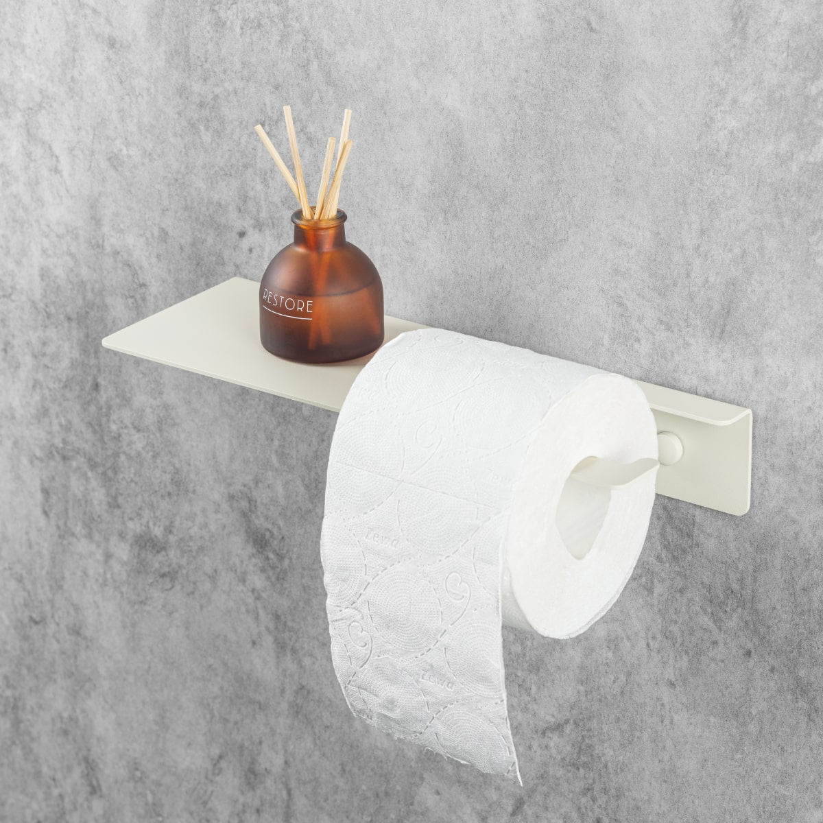  Porte-papier toilette beige avec un diffuseur d'arôme et un rouleau de papier hygiénique sur un support intégré