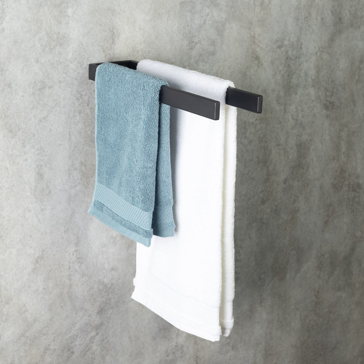 black wall-mounted towel holder, front view, can be used for two towels simultaneously